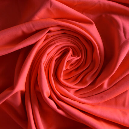 Coral Glo Polyester/Spandex Thermal Knit. One Lot of 15 Yards.