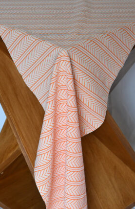 White and Orange Polyrayon blend 34" by 57"